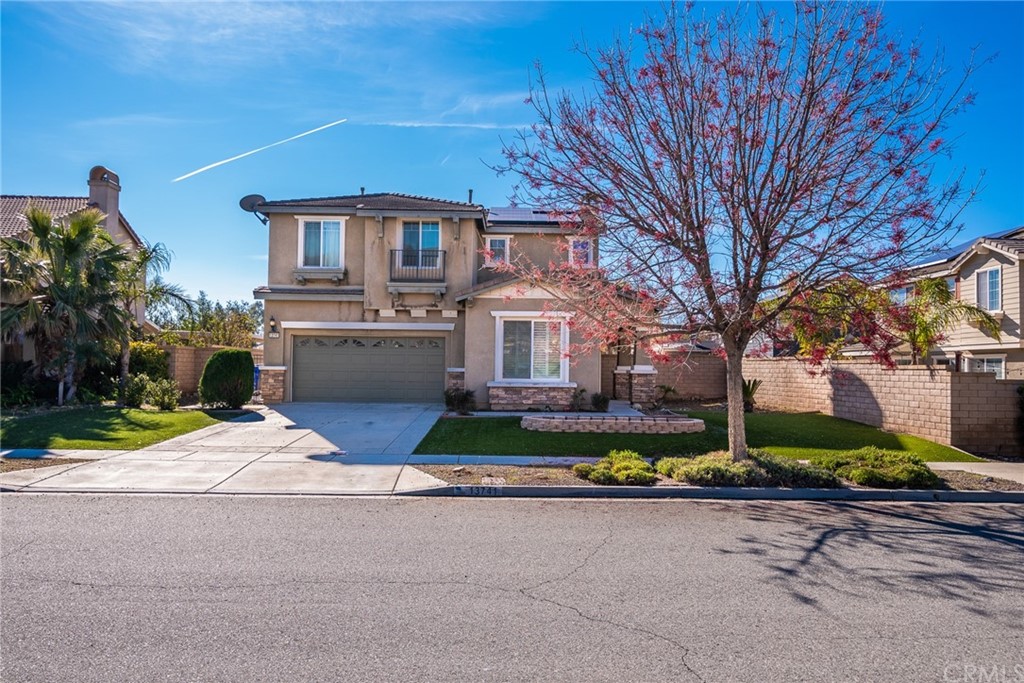 13741 Soledad Way Rancho Cucamonga, CA 91739 - Photo 1 of 1 a front view of house with yard and green space