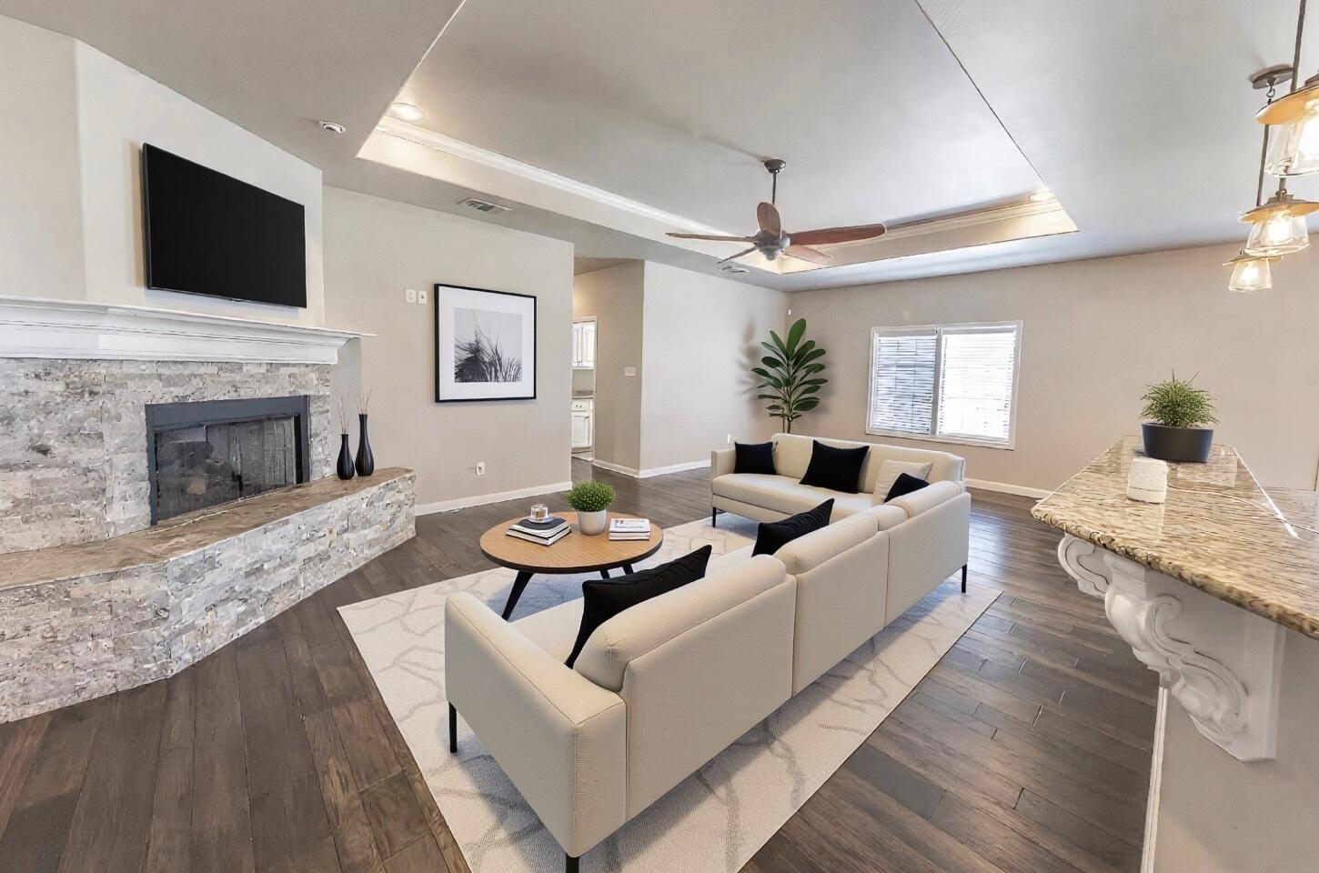 1 Highland Drive Ransom Canyon, TX 79366 - Photo 2 of 27 a living room with furniture fireplace and flat screen tv