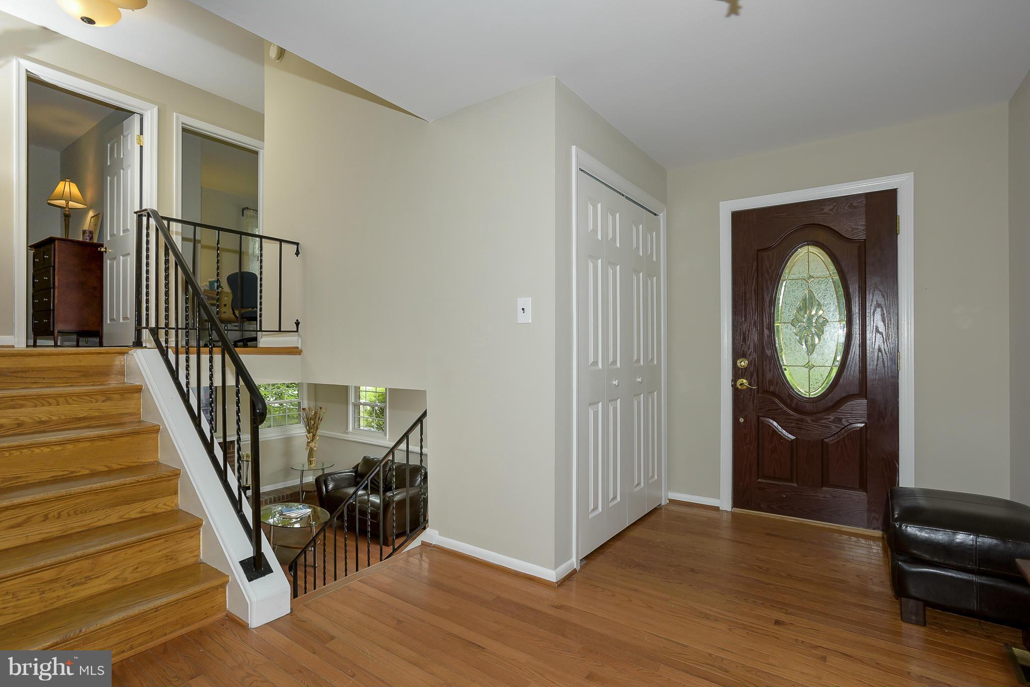 13007 Broadmore Road Silver Spring, MD 20904 - Photo 2 of 30 a view of a hallway with wooden floor and entryway