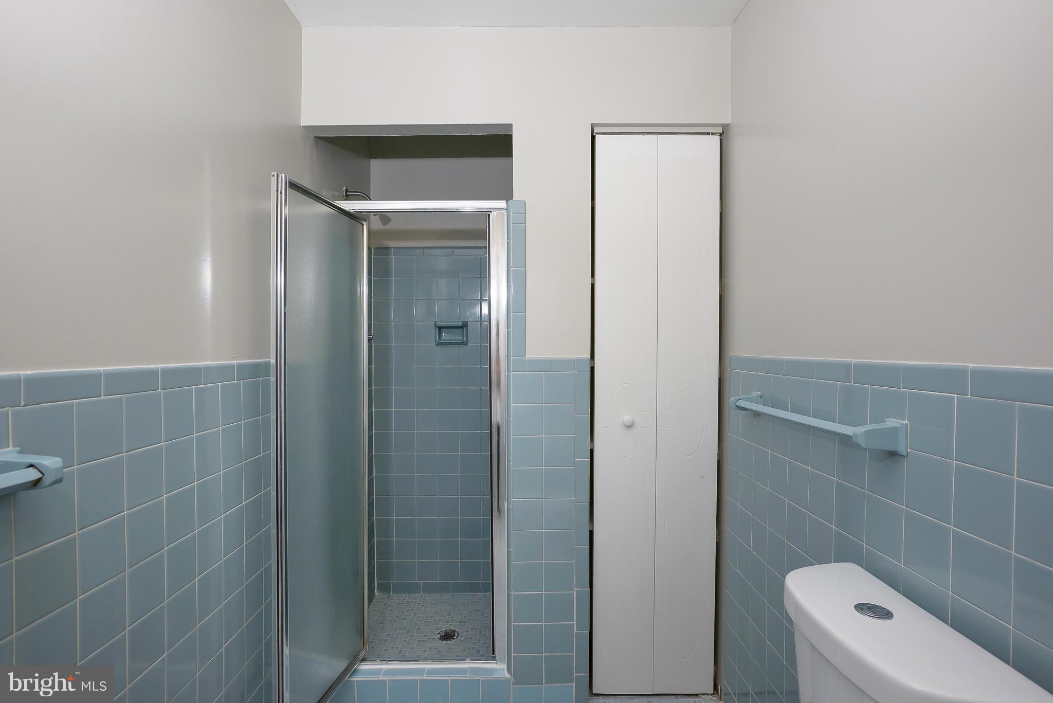 13007 Broadmore Road Silver Spring, MD 20904 - Photo 17 of 30 a bathroom with a shower and toilet