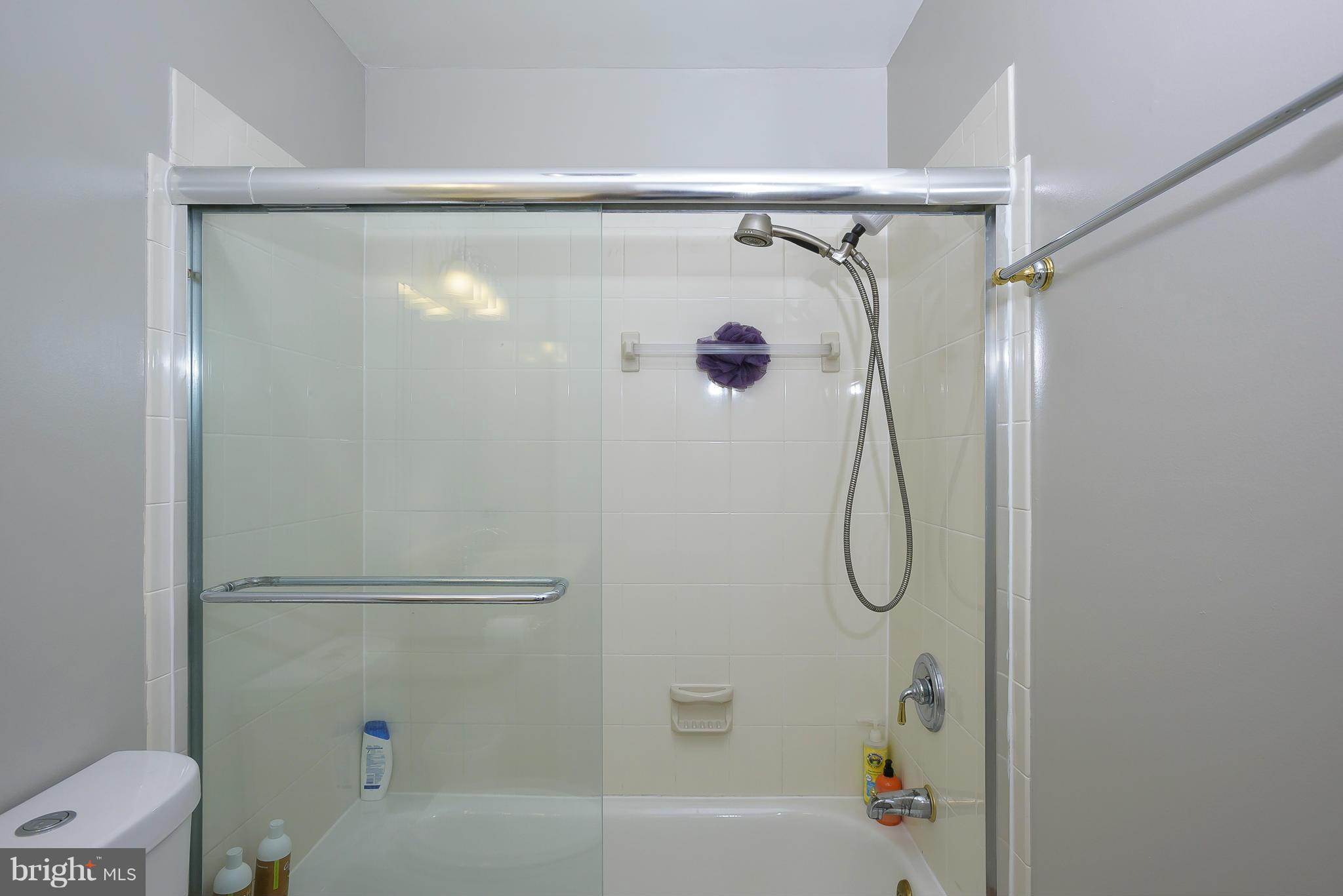 13007 Broadmore Road Silver Spring, MD 20904 - Photo 22 of 30 a bathroom with a shower and a shower