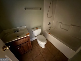 322 Pheasant Ridge Drive Warner Robins, GA 31088 - Photo 19 of 19 a bathroom with a toilet and a shower