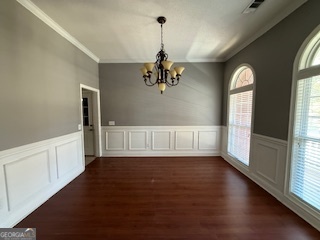 322 Pheasant Ridge Drive Warner Robins, GA 31088 - Photo 3 of 19 a view of empty room with wooden floor and fan