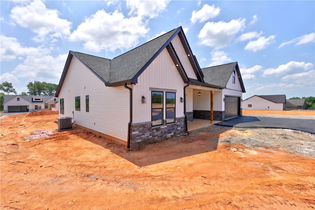 424 Blume Road Anderson, SC 29625 - Photo 2 of 30 Clean lines and a striking facade define this newly constructed residence with modern curb appeal.
