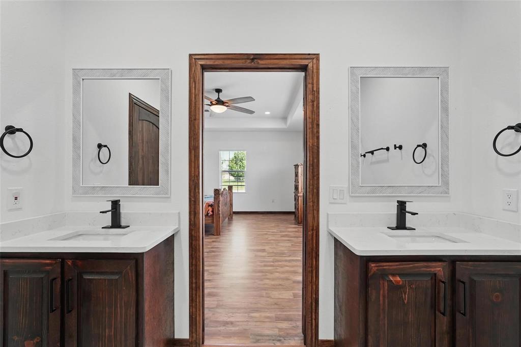 4248 North Fm 273 Ivanhoe, TX 75447 - Photo 17 of 33 a en suite bathroom with a sink and a mirror