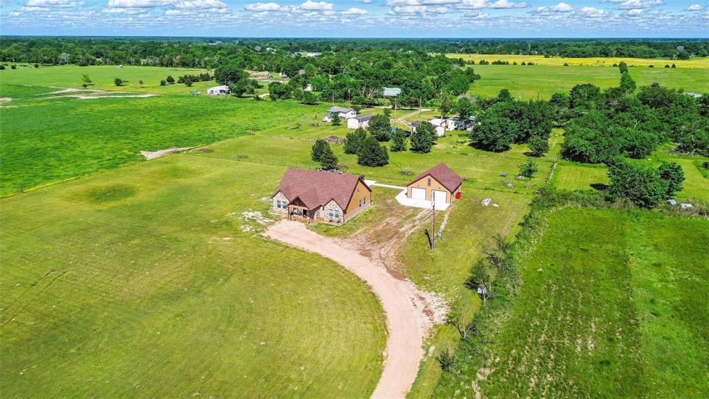 4248 North Fm 273 Ivanhoe, TX 75447 - Photo 2 of 33 a view of a swimming pool with a yard