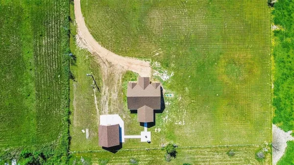 a garden view with a fountain