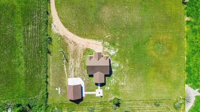 a garden view with a fountain