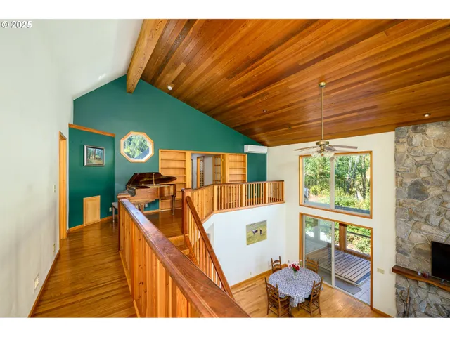 a view of a living room and dining room