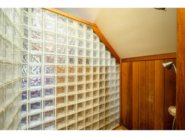 a view of a big room with windows