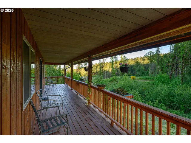 a view of balcony with wooden floor
