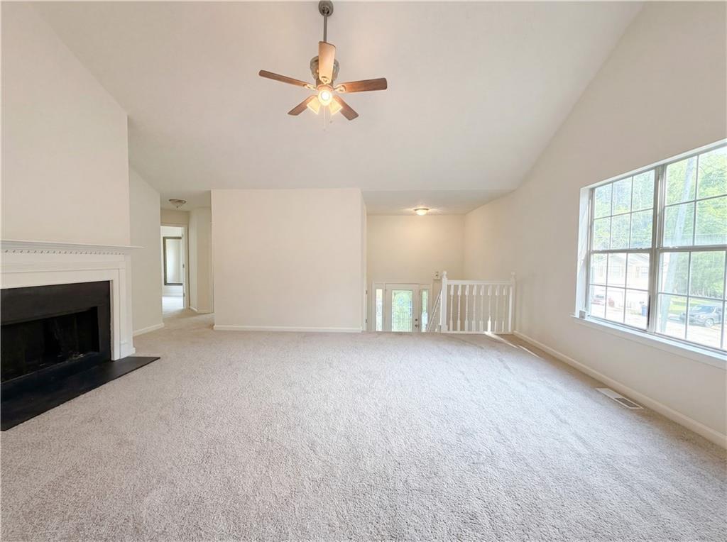 3546 Broad Oak Court Decatur, GA 30034 - Photo 3 of 33 an empty room with windows and fireplace