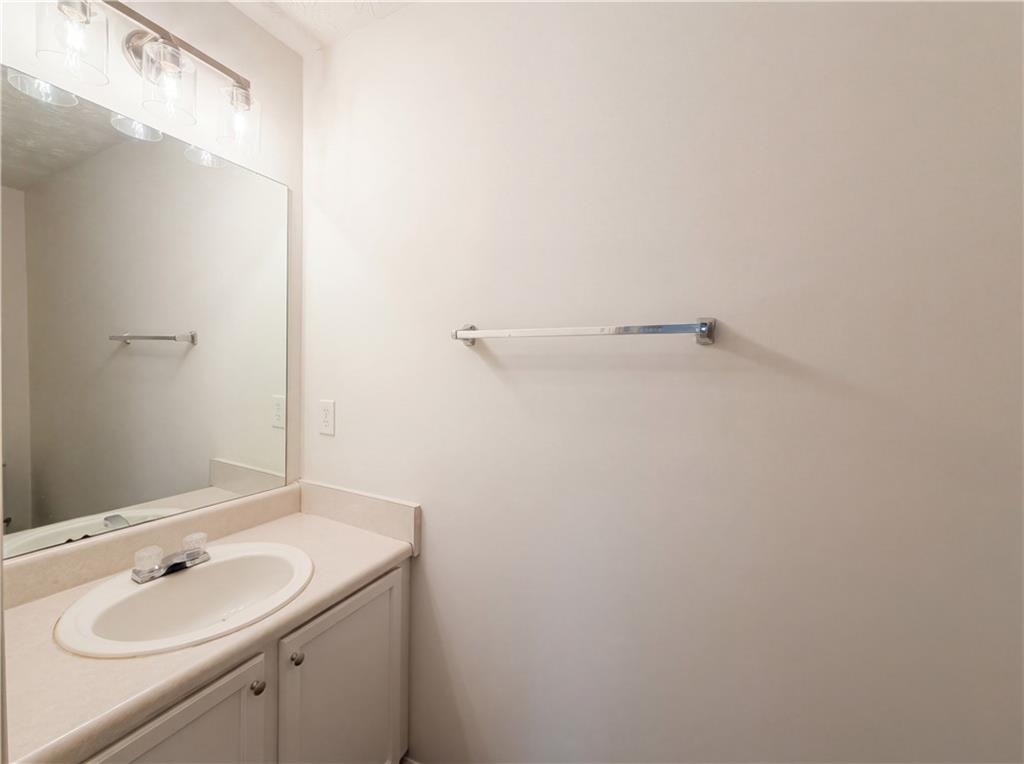 3546 Broad Oak Court Decatur, GA 30034 - Photo 32 of 33 a bathroom with a sink and a mirror