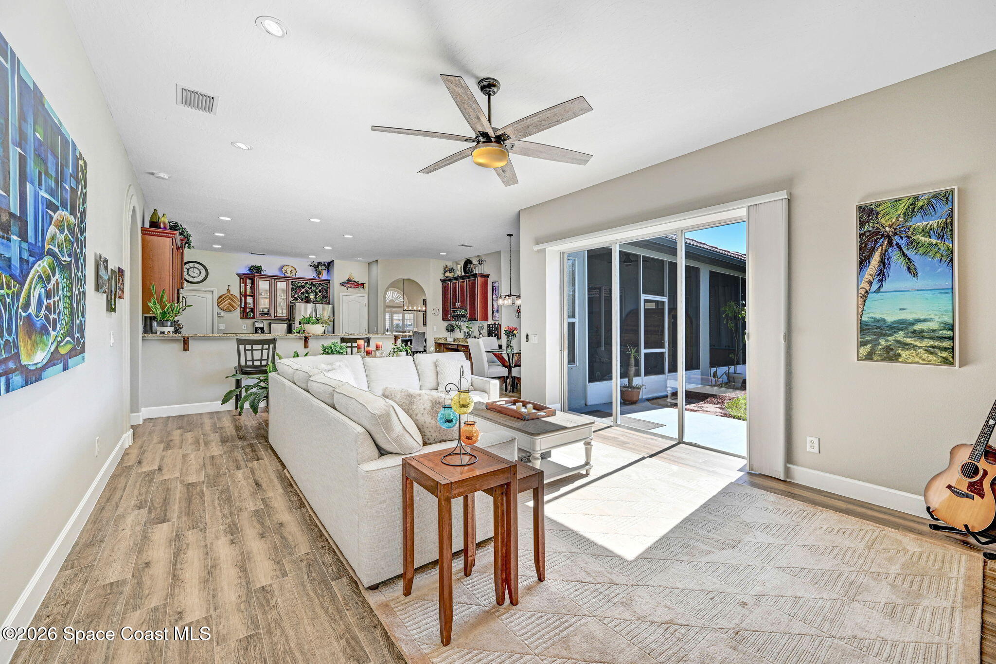 3330 Poseidon Way Indialantic, FL 32903 - Photo 15 of 47 a living room with furniture and a window