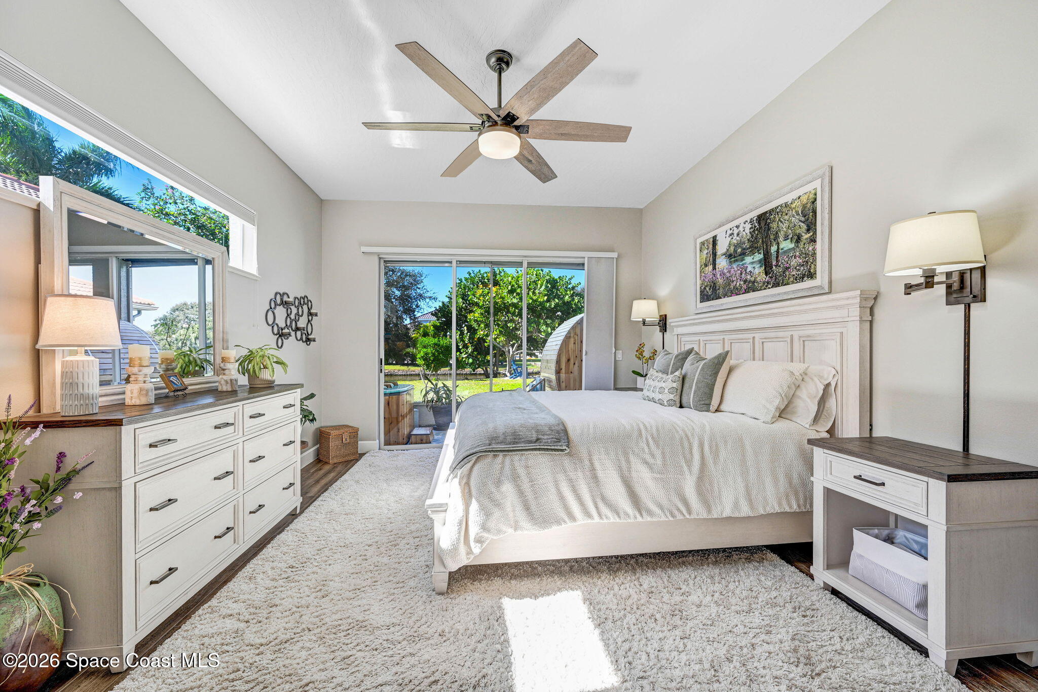 3330 Poseidon Way Indialantic, FL 32903 - Photo 21 of 47 a bedroom with a large bed and a large window