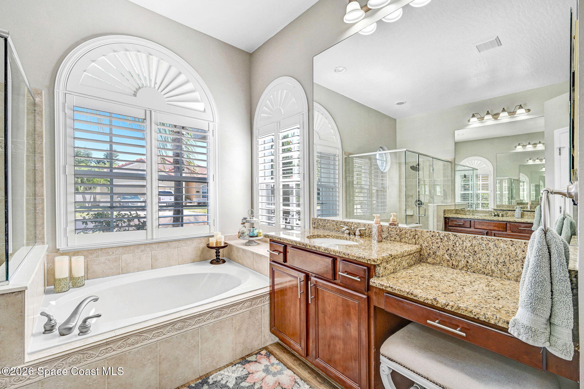 3330 Poseidon Way Indialantic, FL 32903 - Photo 24 of 47 a bath tub sitting next to a window