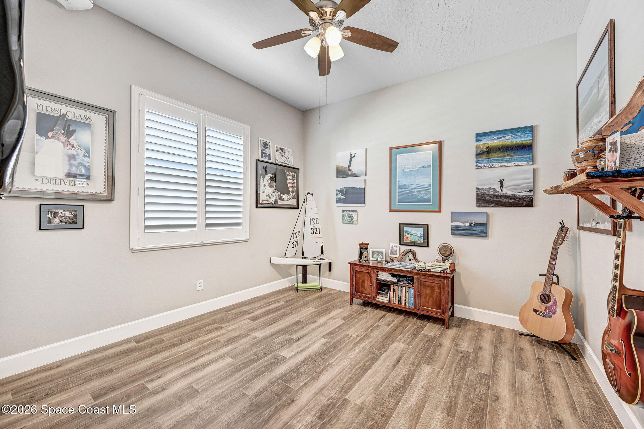 3330 Poseidon Way Indialantic, FL 32903 - Photo 25 of 47 a bedroom with furniture and a window