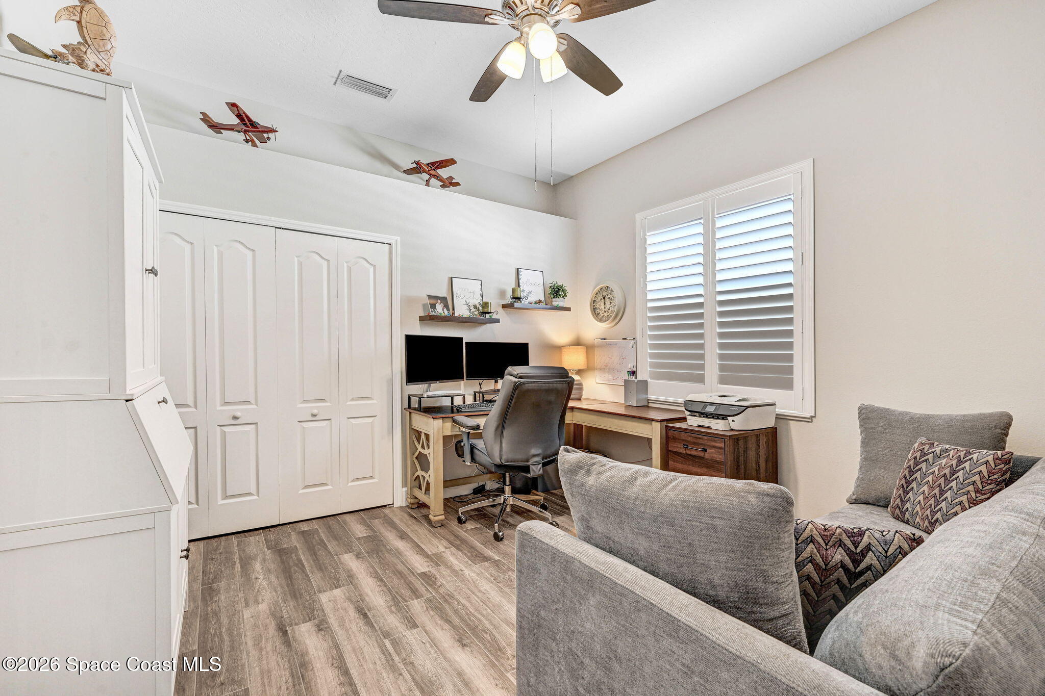 3330 Poseidon Way Indialantic, FL 32903 - Photo 27 of 47 a view of a livingroom with workspace and a window