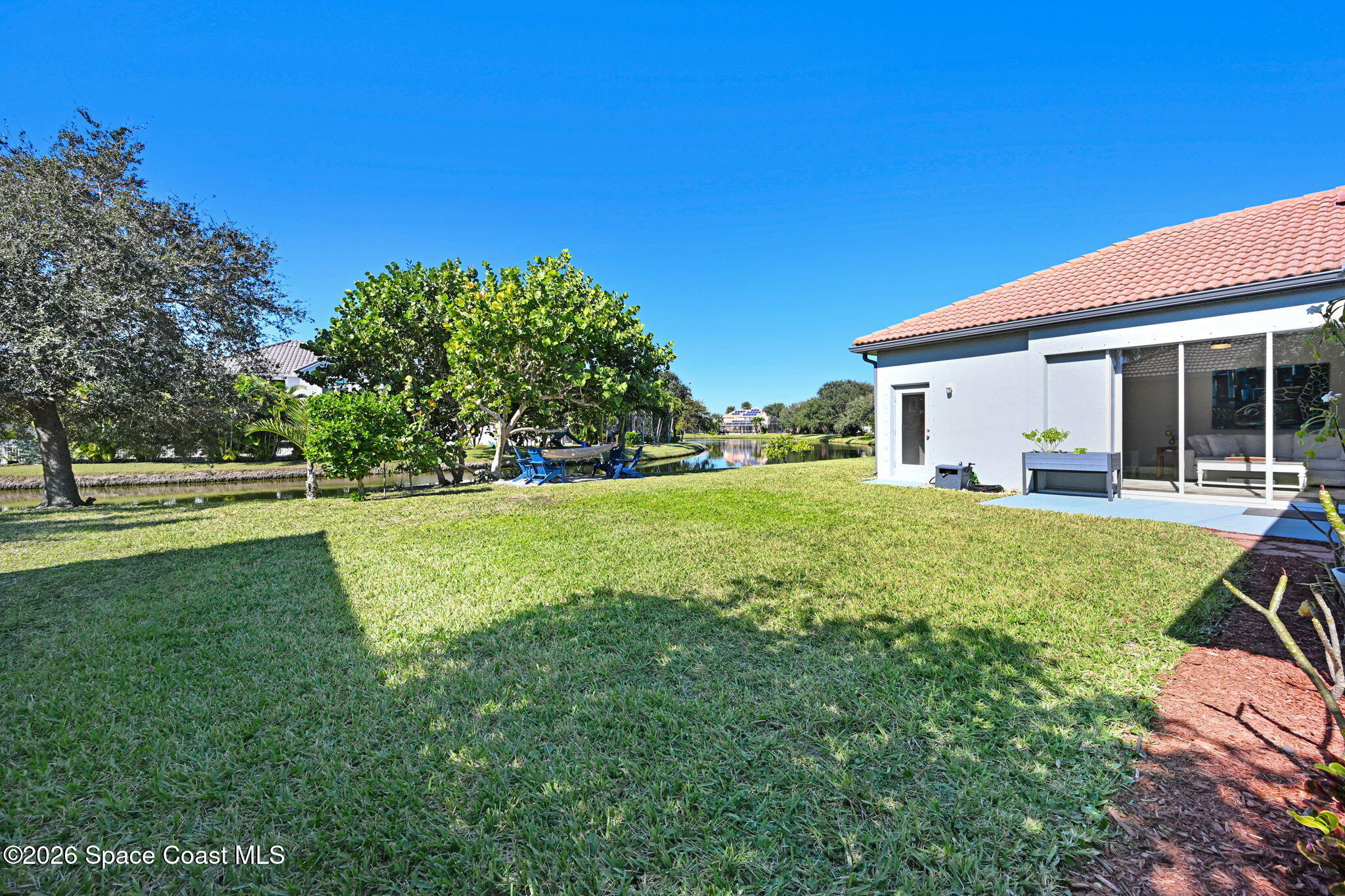 3330 Poseidon Way Indialantic, FL 32903 - Photo 36 of 47 a view of a house with a big yard