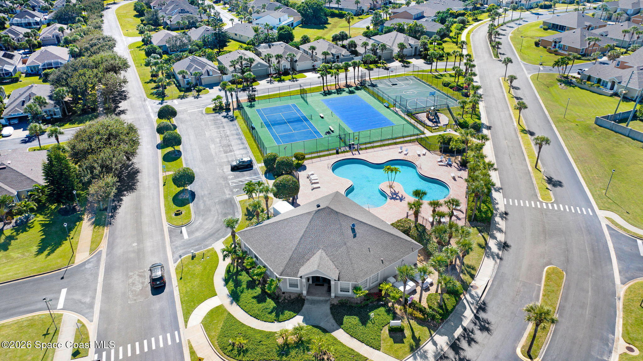 3330 Poseidon Way Indialantic, FL 32903 - Photo 42 of 47 an aerial view of residential house with yard and swimming pool