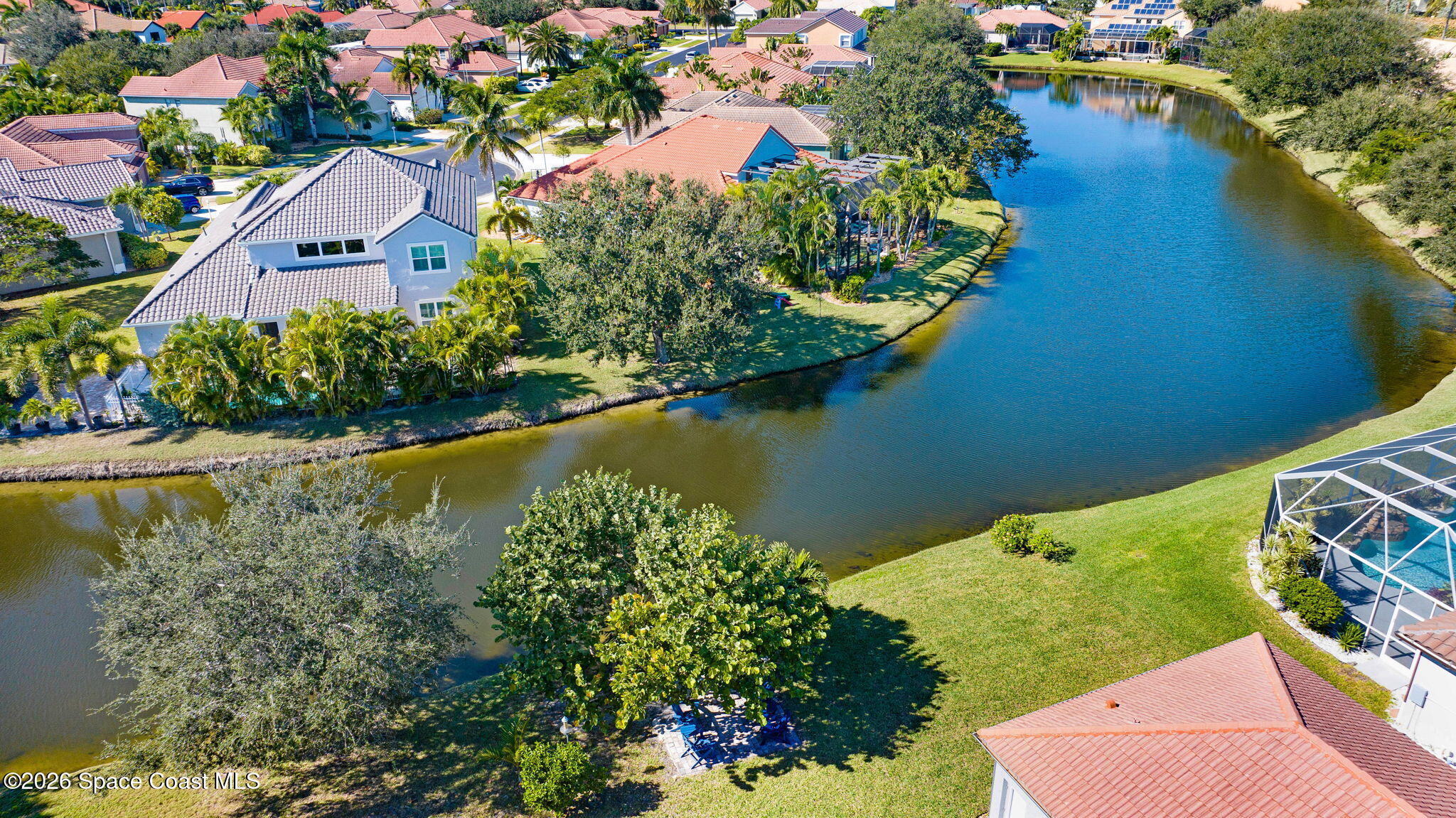 3330 Poseidon Way Indialantic, FL 32903 - Photo 6 of 47 an aerial view of residential houses with outdoor space and lake view