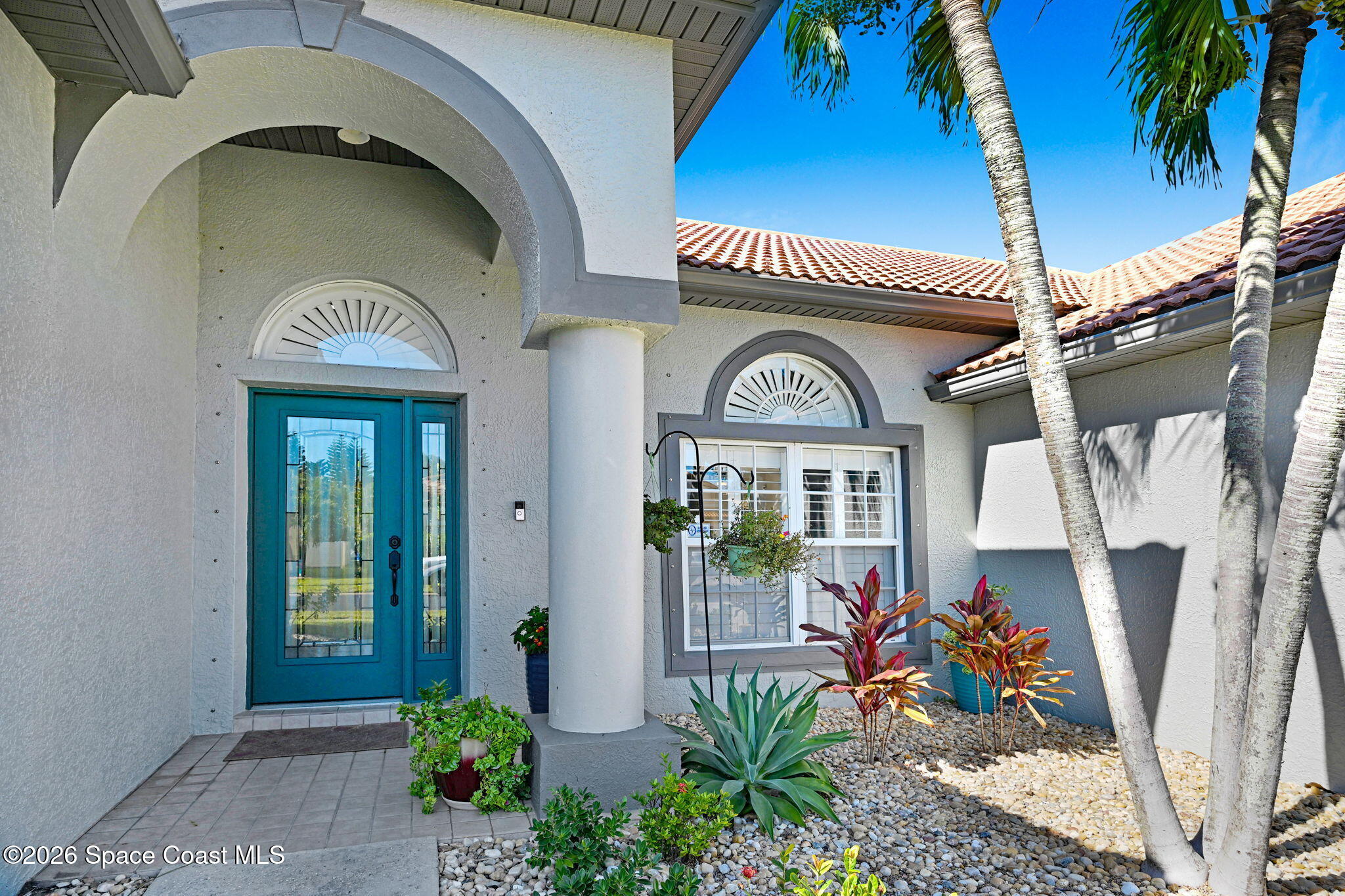 3330 Poseidon Way Indialantic, FL 32903 - Photo 7 of 47 a front view of a house