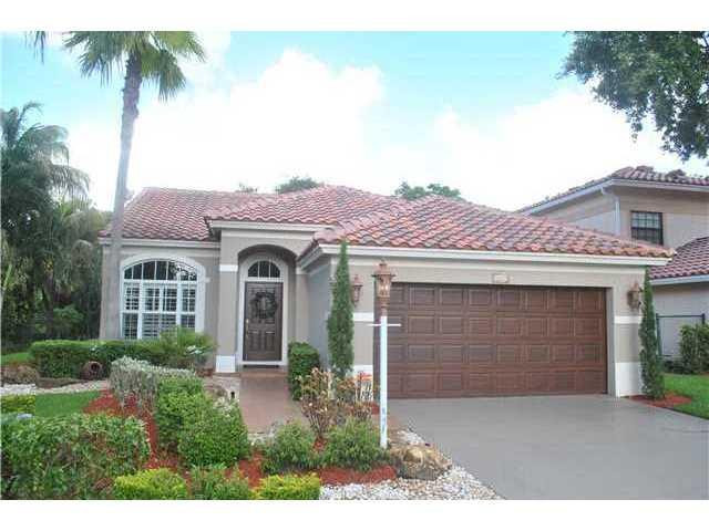 9669 Vía Emilie Boca Raton, FL 33428 - Photo 1 of 25 Exterior Front