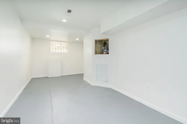 an empty room with a hallway