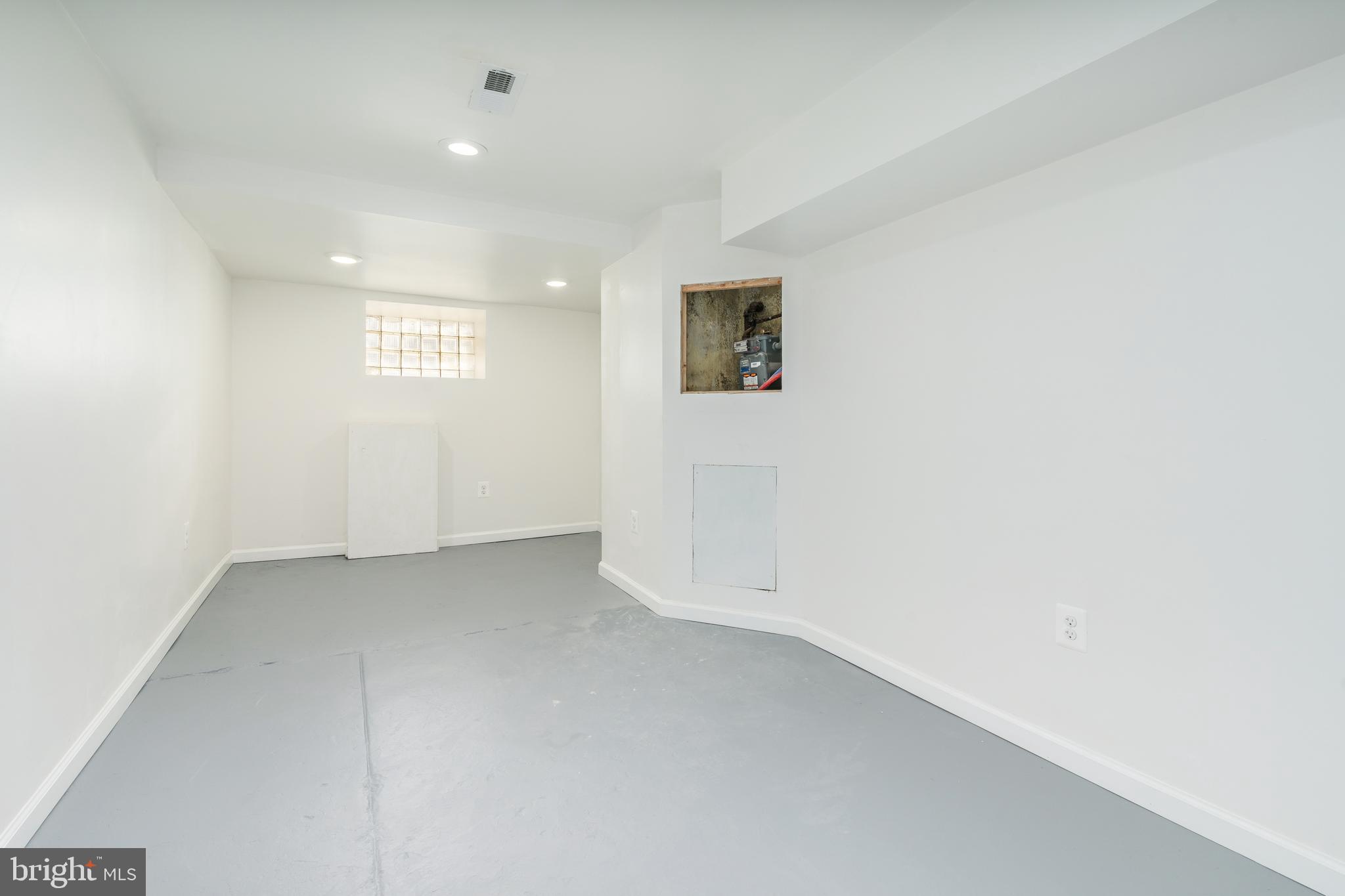 3312 North Bailey Street Philadelphia, PA 19129 - Photo 16 of 35 an empty room with a hallway