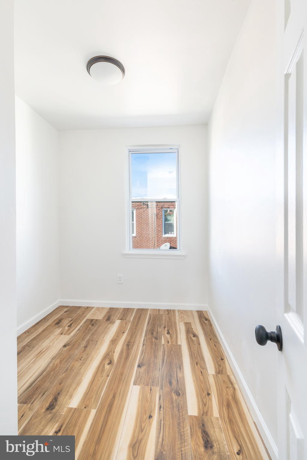 3312 North Bailey Street Philadelphia, PA 19129 - Photo 17 of 35 a view of a room with wooden floor and cabinet