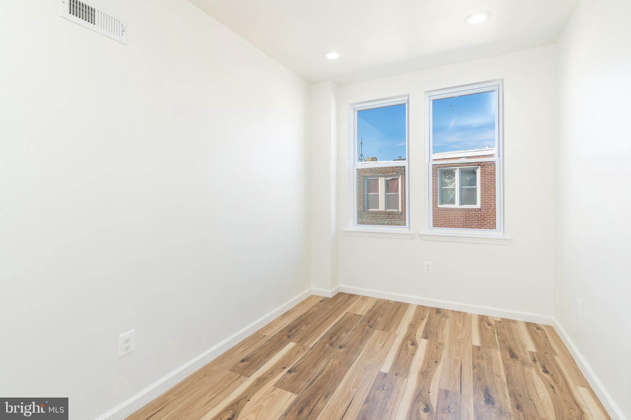 3312 North Bailey Street Philadelphia, PA 19129 - Photo 18 of 35 a view of a room with wooden floor and a window