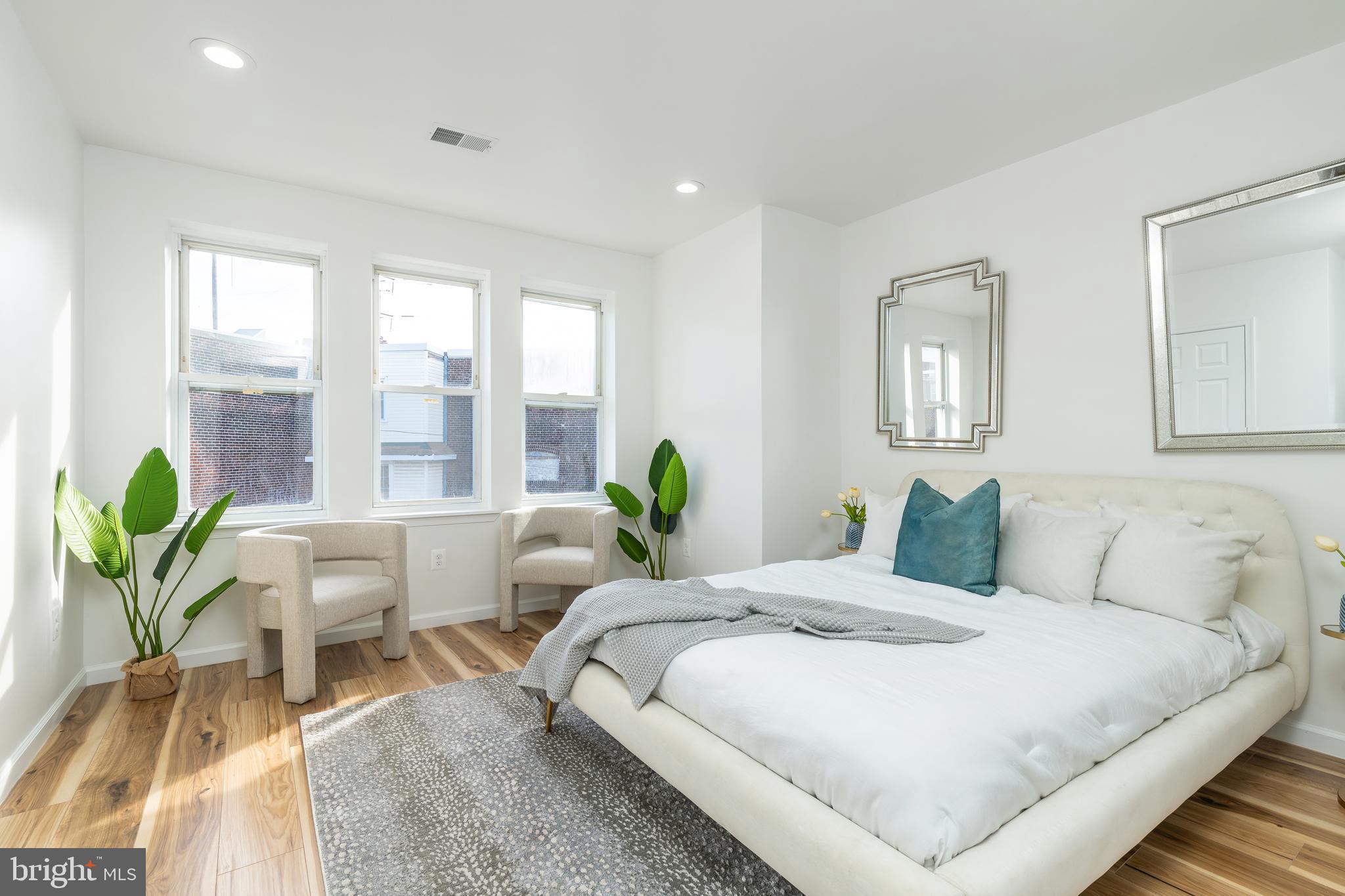 3312 North Bailey Street Philadelphia, PA 19129 - Photo 25 of 35 a bedroom with a bed and a couch