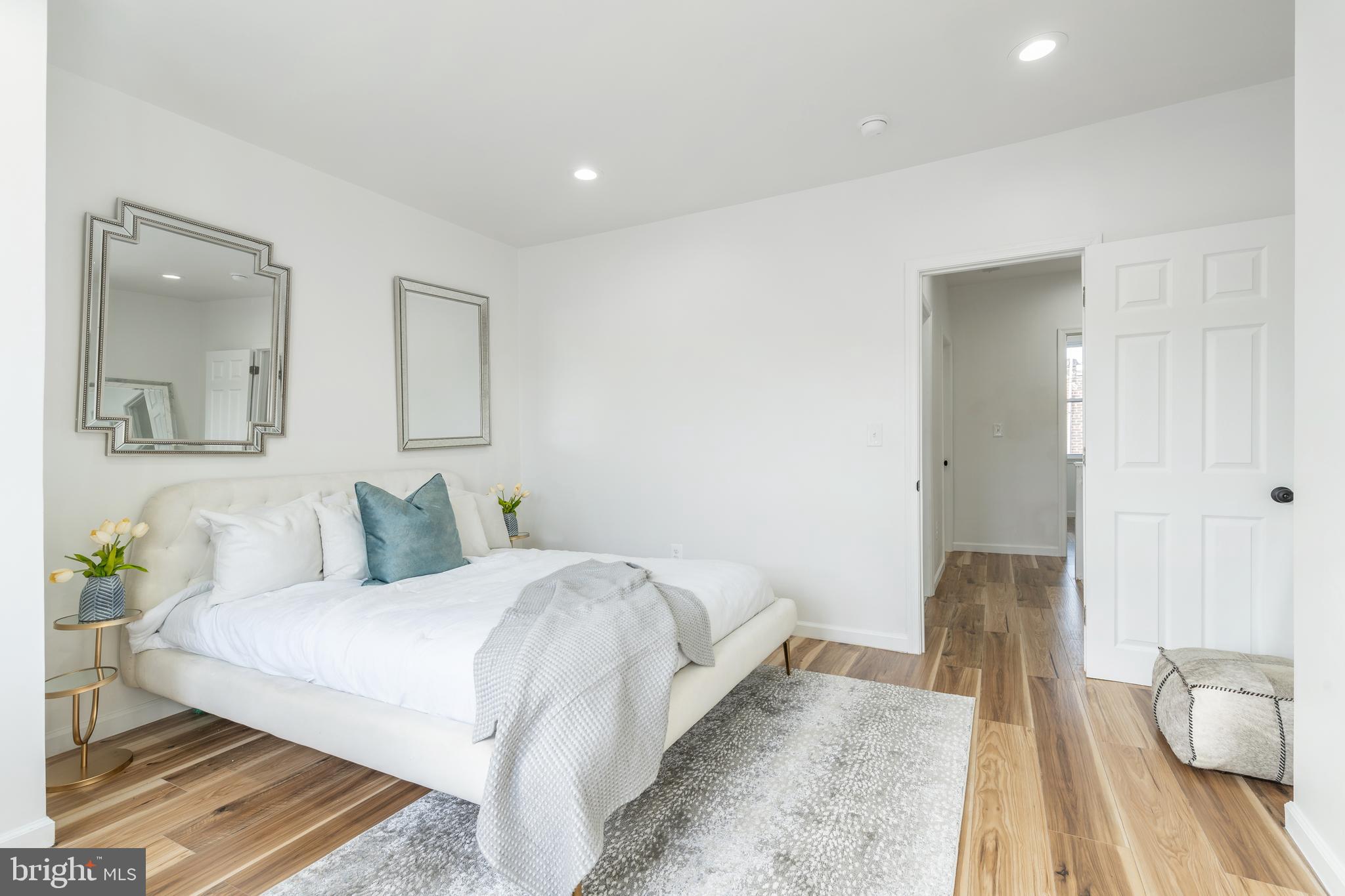 3312 North Bailey Street Philadelphia, PA 19129 - Photo 26 of 35 a bedroom with a bed and a table