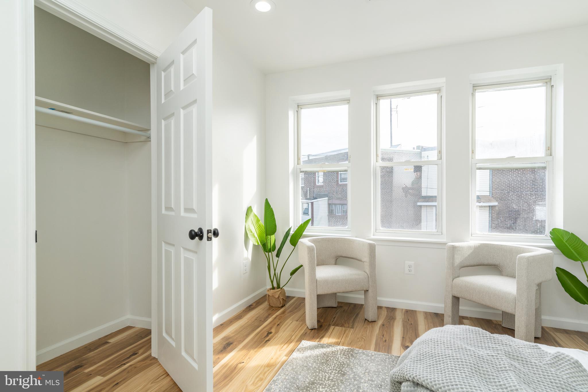 3312 North Bailey Street Philadelphia, PA 19129 - Photo 27 of 35 a living room with furniture and a window