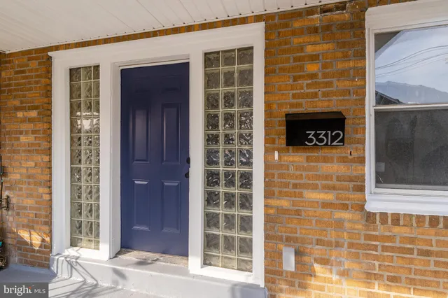 a front view of a house with a shower