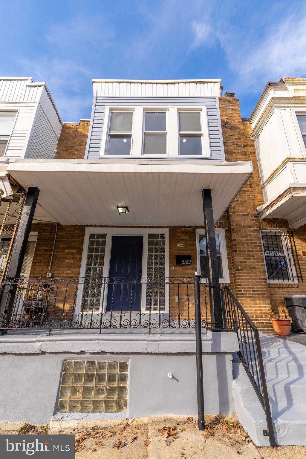 3312 North Bailey Street Philadelphia, PA 19129 - Photo 31 of 35 a front view of a house with glass windows
