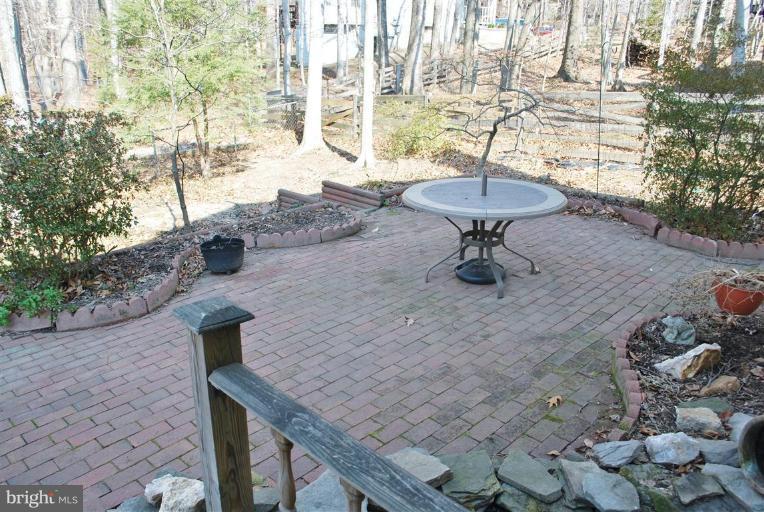 7837 Roundabout Way Springfield, VA 22153 - Photo 20 of 24 a view of a terrace with a sink and a yard