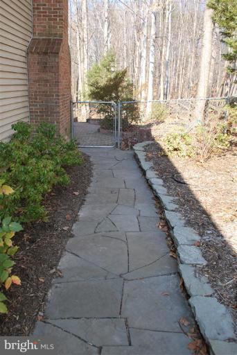 7837 Roundabout Way Springfield, VA 22153 - Photo 22 of 24 a view of a backyard with pathway