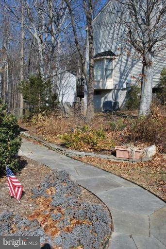 7837 Roundabout Way Springfield, VA 22153 - Photo 23 of 24 a view of a yard with large trees