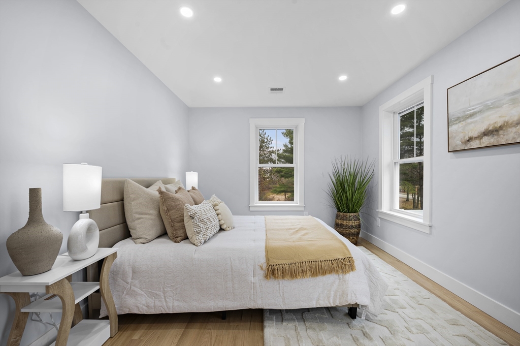 69 Readville Street, Unit B Boston, MA 02136 - Photo 16 of 38 a bedroom with bed and window