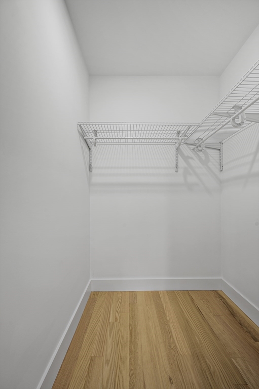 69 Readville Street, Unit B Boston, MA 02136 - Photo 28 of 38 a view of a room with racks on the wall