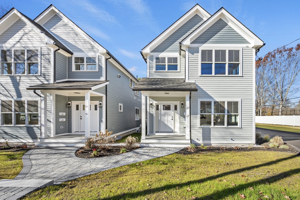 69 Readville Street, Unit B Boston, MA 02136 - Photo 33 of 38 a front view of a house with garden
