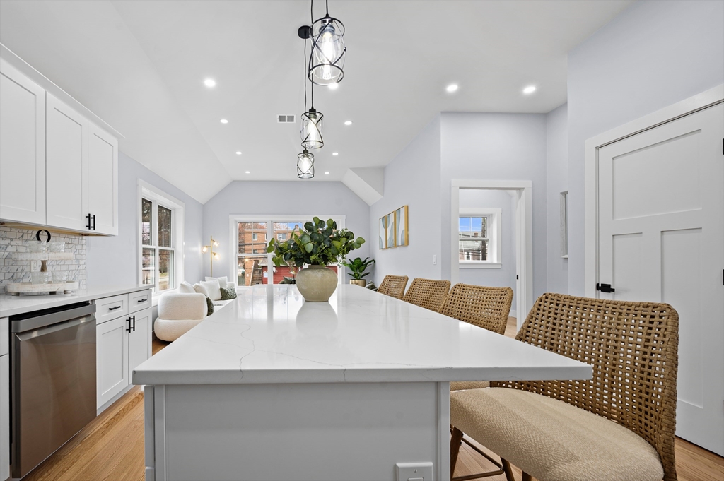 69 Readville Street, Unit B Boston, MA 02136 - Photo 9 of 38 a view of a dining room with furniture and wooden floor