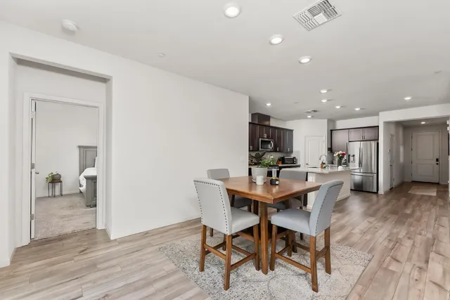 a view of a dining room with furniture