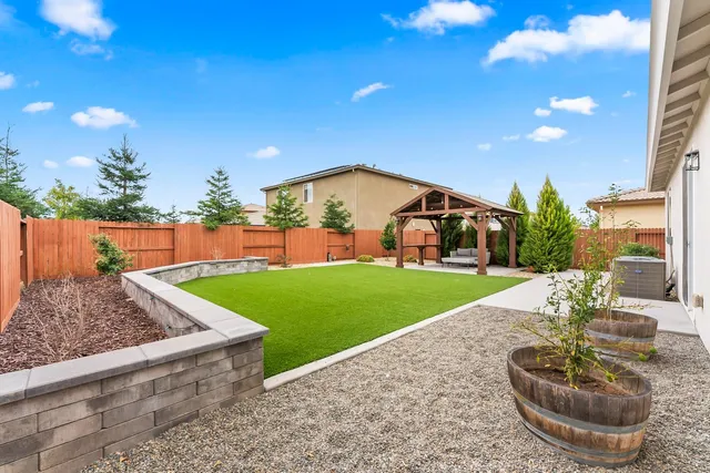 a house view with a garden space
