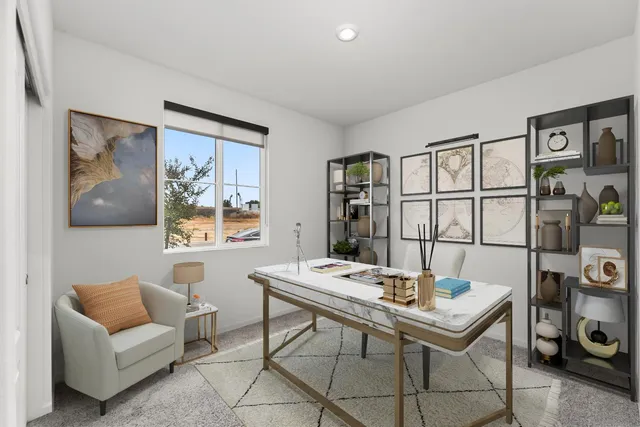 a living room with furniture and baby