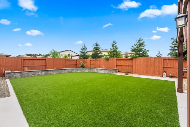 a view of a garden with an outdoor space