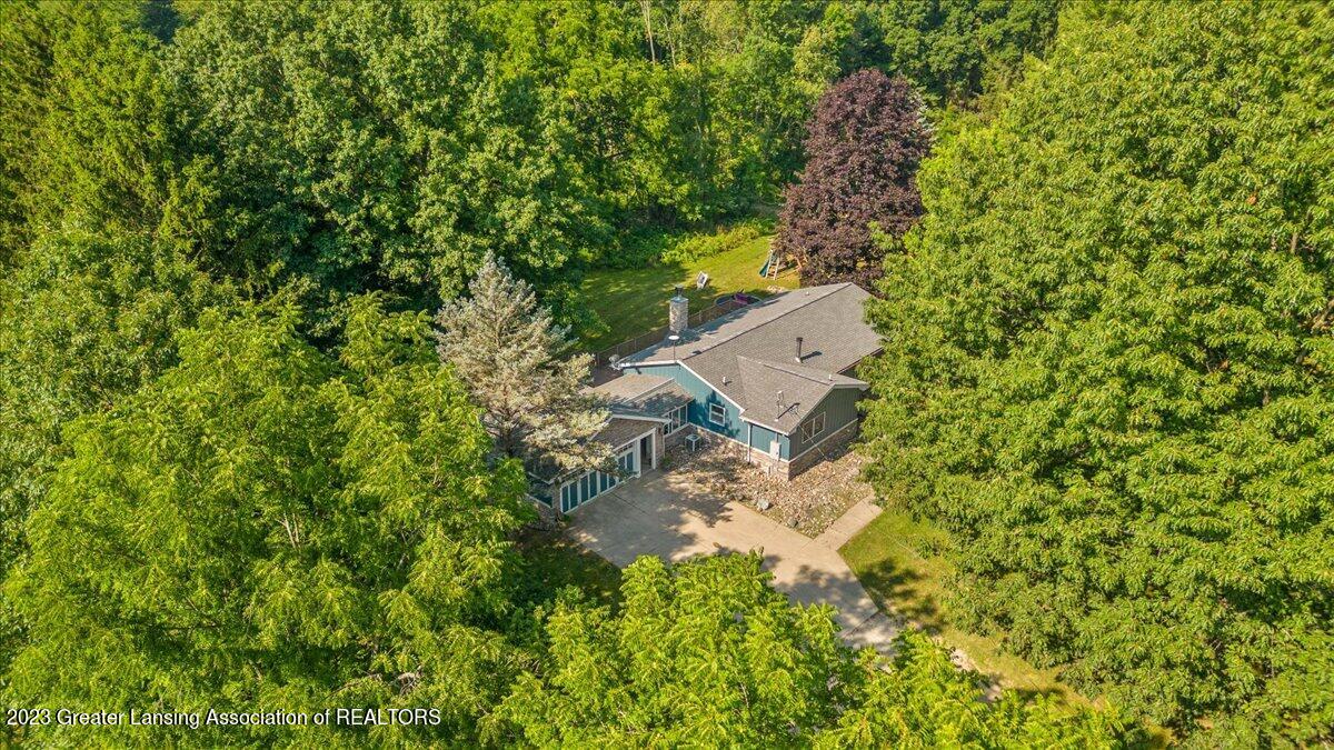 5747 Harper Road Holt, MI 48842 - Photo 4 of 42 07-Media Jett-5