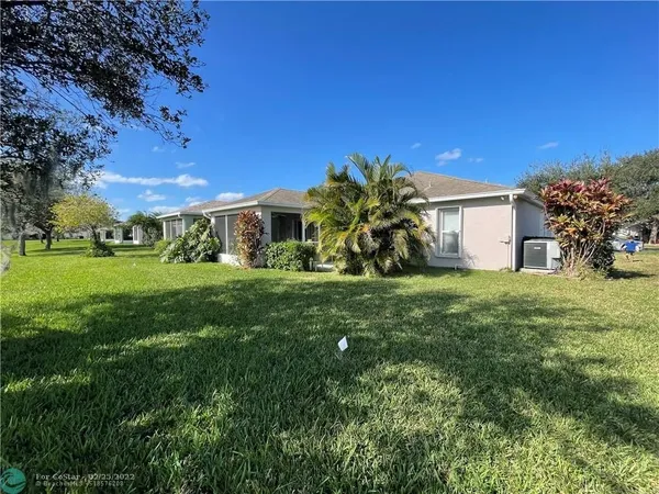 a view of a house with a big yard