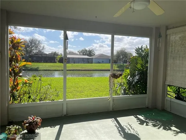 a view of a yard from a balcony